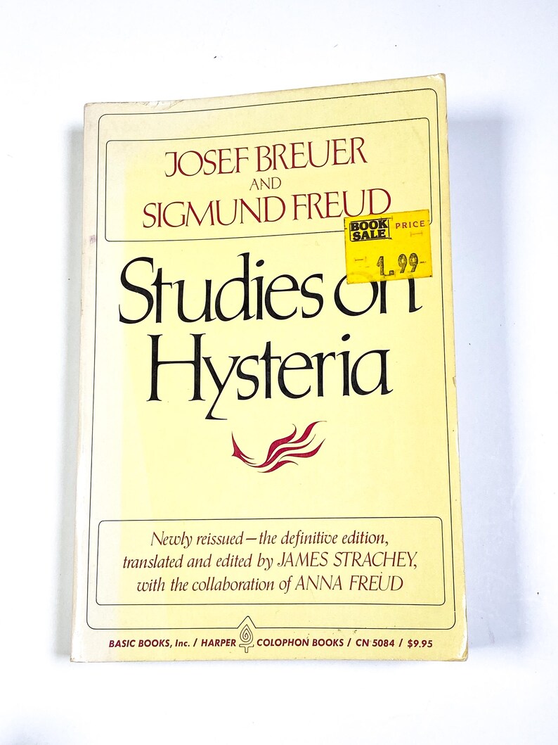 a book with a yellow cover sitting on top of a table