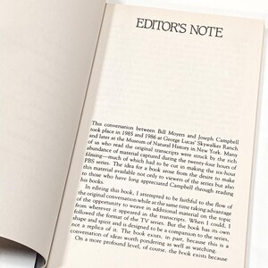 a close up of a book with an open page