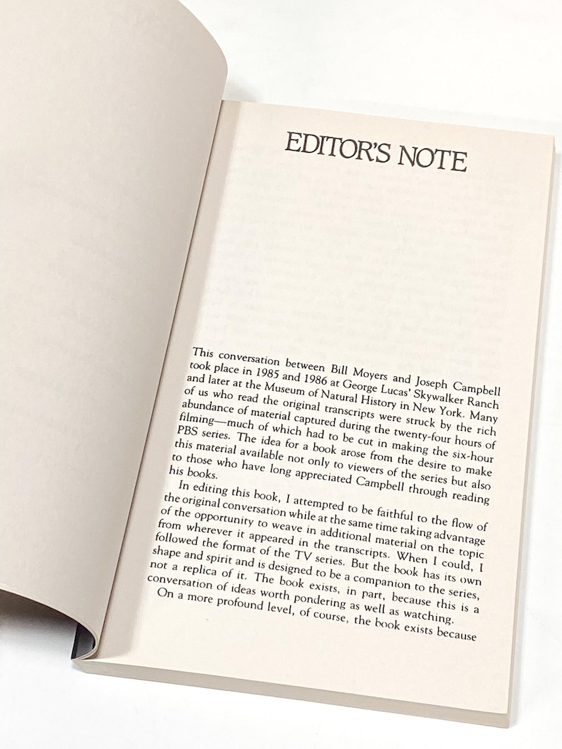 a close up of a book with an open page