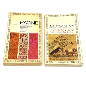 May include: Two vintage French books, "Racine" and "La Fontaine Fables," are displayed. The "Racine" book has a colorful cover with geometric figures. The "La Fontaine Fables" book features an illustration of a crow and fox. Both books are from Garnier Flammarion.