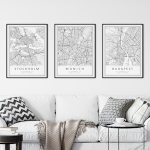 Mockup map print examples. Maps are displayed in black frames on a white wall.
The example pictures are in portrait. The displayed maps are in black and white.