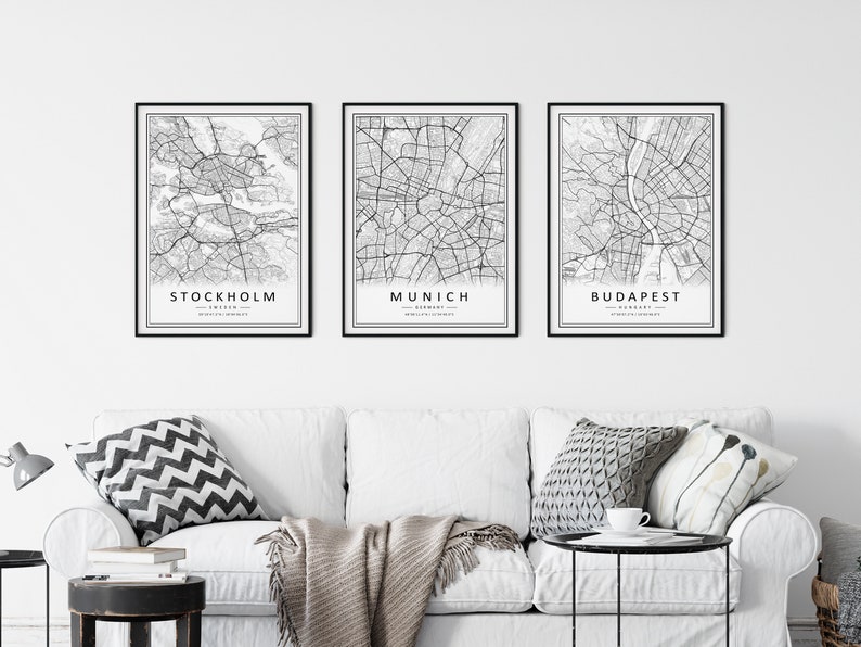 Mockup map print examples. Maps are displayed in black frames on a white wall.
The example pictures are in portrait. The displayed maps are in black and white.