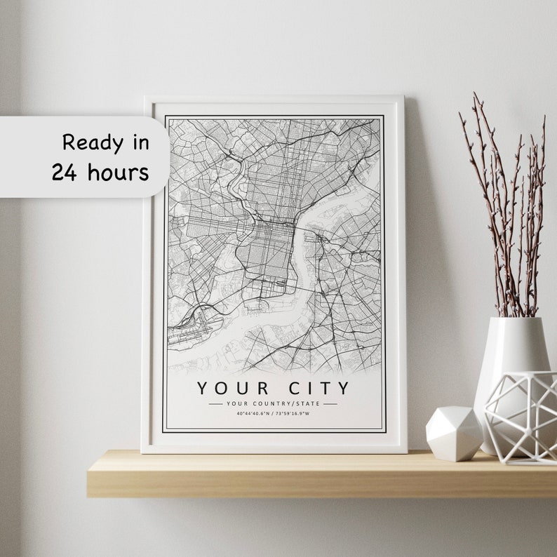 Mockup map print example. Map is displayed in black frames on a white wall.
The example picture is in portrait. The displayed map is in a classic style.