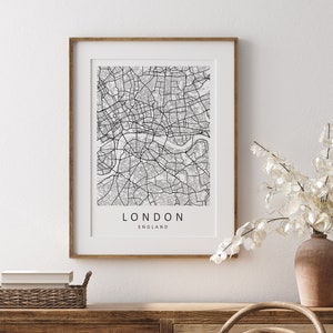 Mockup map print example. Map is displayed in a birch frame with a mat on a white wall.
The example pictures are in portrait.