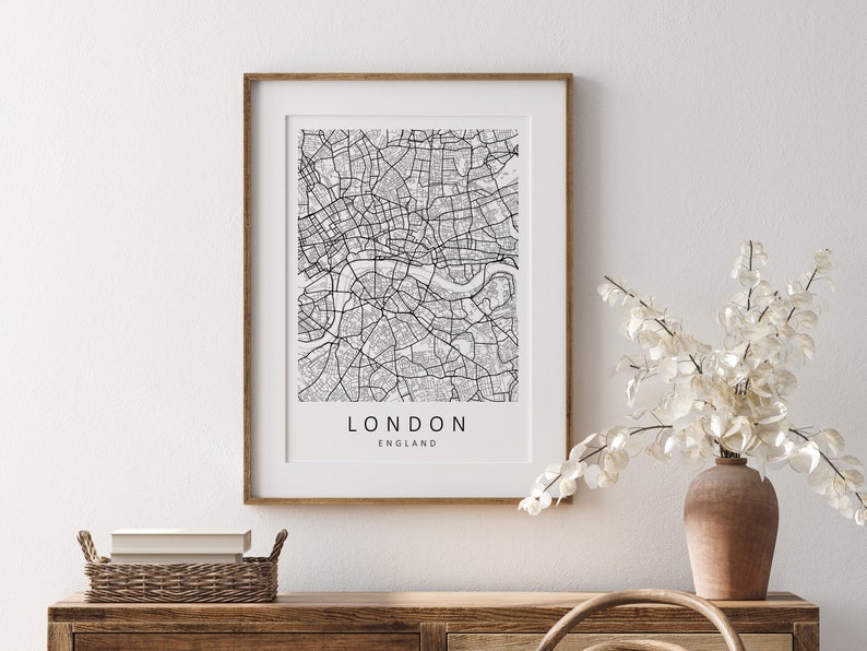 Mockup map print example. Map is displayed in a birch frame with a mat on a white wall.
The example pictures are in portrait.