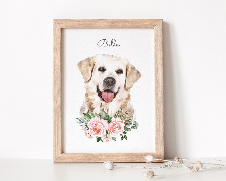 Watercolor dog portrait displayed in a wooden frame. The dog has a white coat. Below the dog portrait flowers are displayed.