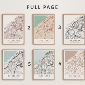May include: Six different versions of a map print of Cleveland, Ohio. Each map is framed in a light wood frame and has a different color scheme. The maps are numbered 1 through 6.