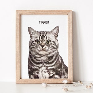 Watercolor cat portrait displayed in a wooden frame.
