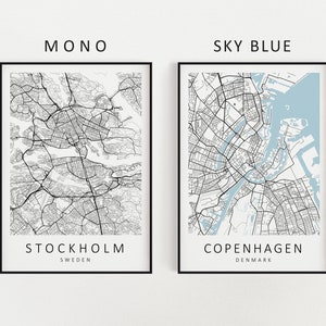 Mockup map print examples. Maps are displayed in black frames on a white wall.
The example pictures are in portrait. Displayed maps are in styles MONO and SKY BLUE.