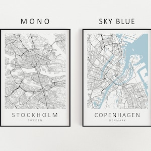 Mockup map print examples. Maps are displayed in black frames on a white wall.
The example pictures are in portrait. Displayed maps are in styles MONO and SKY BLUE.
