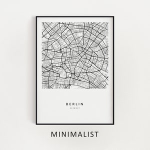 Mockup map print example. Map is displayed in black frames on a white wall.
The example picture is in portrait. The displayed map is in a minimalist style.