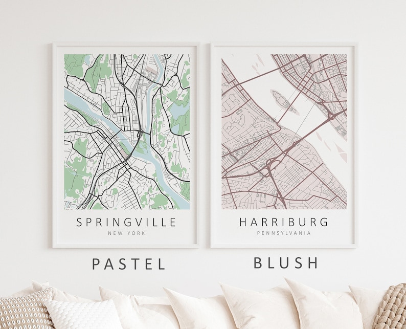 Mockup map print examples. Maps are displayed in a white frame on a white wall.
The example pictures are in portrait. The displayed maps are in pastel and blush color palettes.
