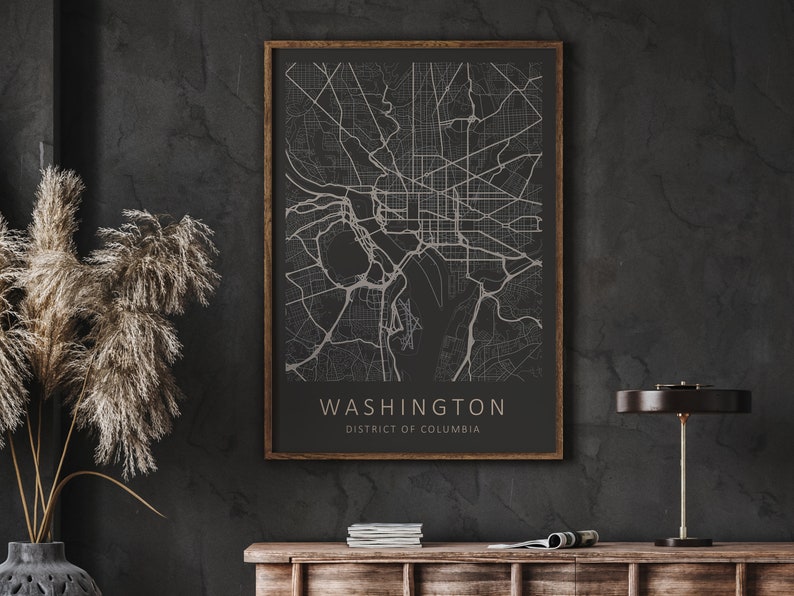 Mockup map print example. The map is displayed in a wooden frame on a black wall.
The example pictures are in portrait. The displayed map is in a dark color scheme.