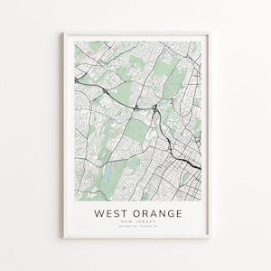 May include: A framed map print of West Orange, New Jersey, featuring a detailed street and road network in black against a white background. Parks and green spaces are highlighted in light green. The text "WEST ORANGE NEW JERSEY" is printed at the bottom.