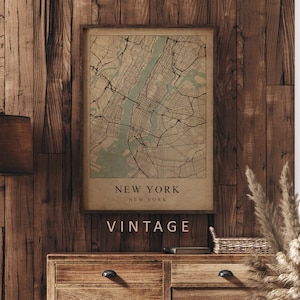 Mockup map print example. Map is displayed in a wooden frame on a wooden wall. The Interior could be described as rustic or farmhouse chic.
The example picture is in portrait. The displayed map is in a vintage style.