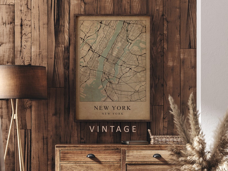 Mockup map print example. Map is displayed in a wooden frame on a wooden wall. The Interior could be described as rustic or farmhouse chic.
The example picture is in portrait. The displayed map is in a vintage style.