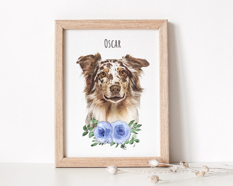 Watercolor dog portrait displayed in a wooden frame. Below the dog portrait flowers are displayed.