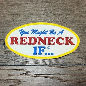May include: A white oval patch with a yellow border and blue and red embroidered text that reads "You Might Be A REDNECK IF..."