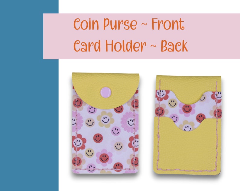 May include: A yellow coin purse with a pink button and a white background with a pattern of pink and red smiley faces and flowers. The back of the purse is yellow with a pocket for cards.
