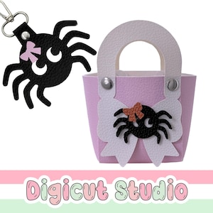 May include: A black spider keyring with a pink bow and a light purple handbag featuring a white handle, a white bow, and a black spider with a brown bow. The text Digicut Studio is displayed in a bubble font at the bottom of the image.