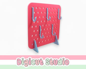 May include: A pink pegboard with blue hooks and supports. The pegboard has evenly spaced holes for the hooks. The hooks are curved and evenly spaced. The pegboard is standing upright.