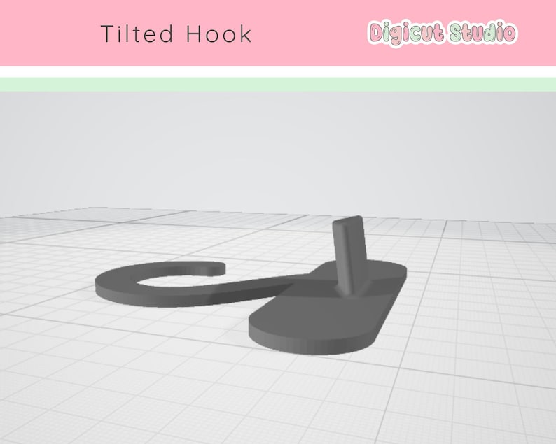 May include: A gray, tilted hook design with a rectangular base and a curved hook. The text "Tilted Hook" is above the hook, and the "Digicut Studio" logo is in the upper right corner. The hook is set against a white background with a grid pattern.