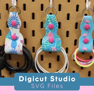 Organiseurs de câbles Porte-clés SVG.  Organiseur de téléphone principal svg. Colliers de serrage svg. Porte-clés élastique à cheveux. Accessoires pour panneaux perforés . Cartable. AC142.