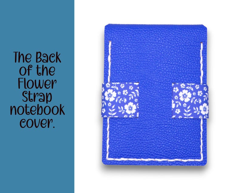 May include: A blue notebook cover with white stitching and two floral patterned straps. The text on the left says, "The Back of the Flower Strap notebook cover."