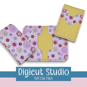 May include: Three wallet designs featuring a pink and white fabric with a repeating pattern of yellow smiley faces. The wallets are yellow, pink, and white.