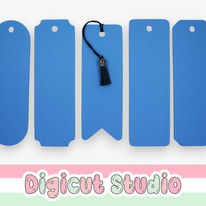 May include: Five blue bookmarks in various shapes. One bookmark has a black tassel. The bookmarks are made of a solid blue material. The bottom of the image has the text "Digicut Studio" in a colorful, playful font.