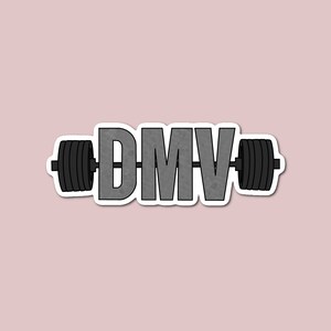 May include: A white sticker with a gray barbell with the word "DMV" on it.