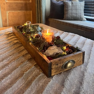 Long narrow tray outlet for dining table