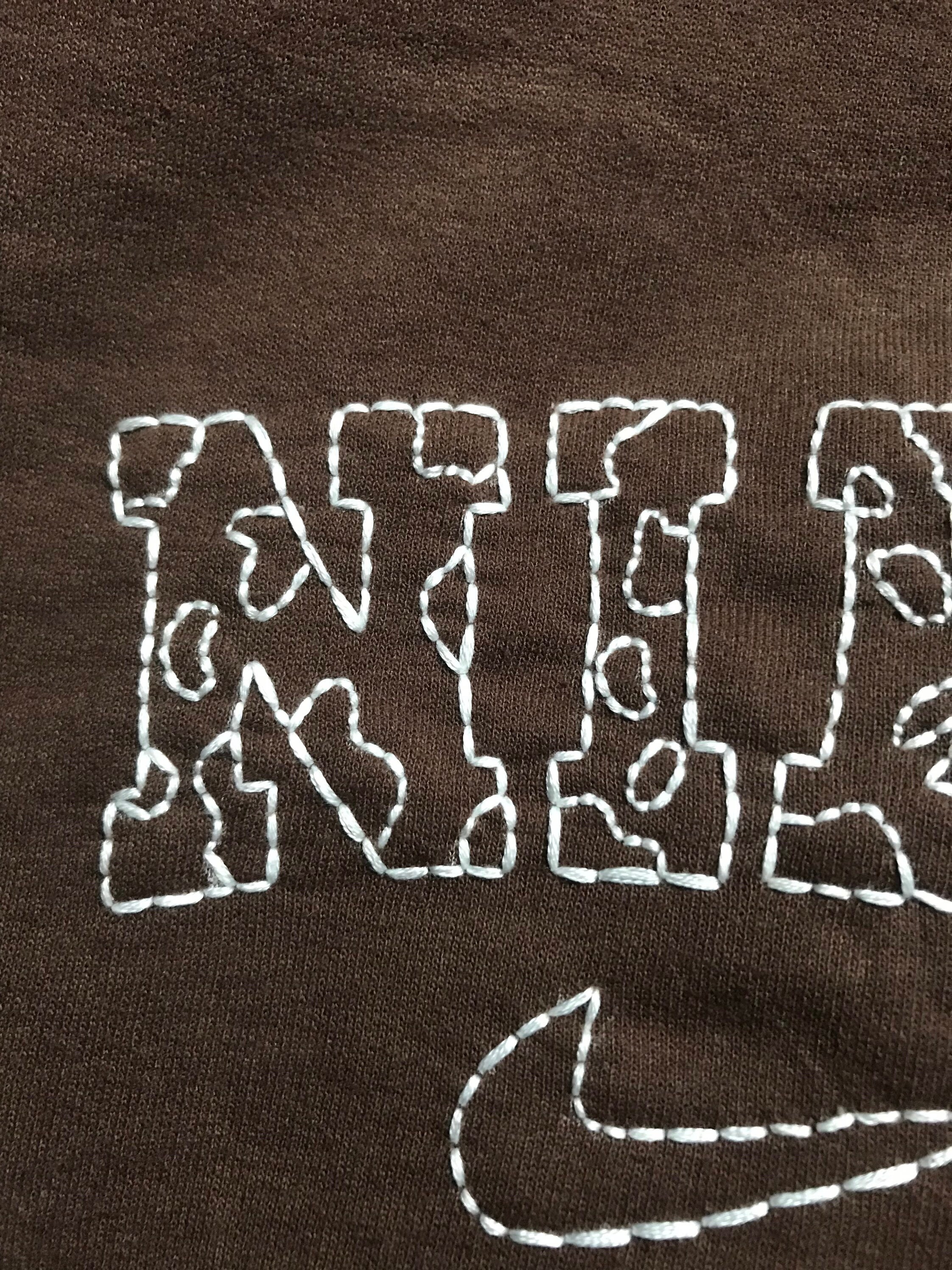 nike cow print embroidered sweatshirt