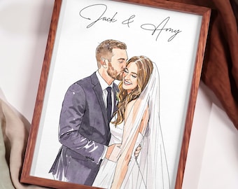 May include: A framed watercolor illustration of a couple in wedding attire, with the groom kissing the bride on the cheek. The text Jack & Amy is written in black script at the top of the white paper inside a brown wooden frame.
