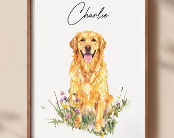 May include: A framed wall art print featuring a watercolor illustration of a golden retriever dog sitting in a patch of colorful wildflowers. The name Charlie is written in black cursive script above the dog on a white background.
