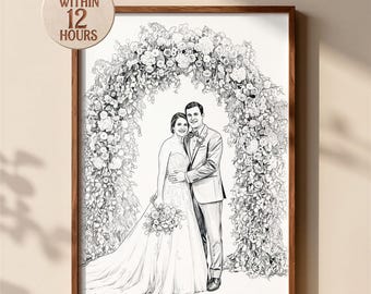 May include: A black and white pencil sketch print in a wooden frame depicting a couple standing under a large floral arch. The person on the left wears a strapless gown and holds a bouquet, while the person on the right wears a suit and tie.