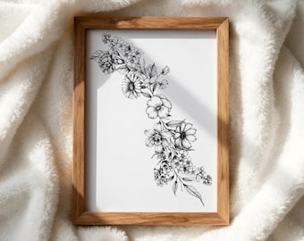 May include: A rectangular wooden frame containing a white print with a black ink botanical illustration. The artwork features a diagonal arrangement of various flowers, including daisies, daffodils, and small blossoms with detailed leaves.