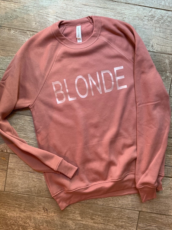 blonde sweatshirt pink