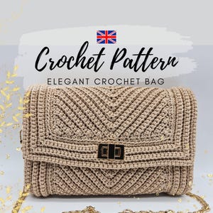 May include: A beige crochet bag with a gold chain strap and a gold clasp. The bag has a chevron pattern and is made with a chunky yarn.