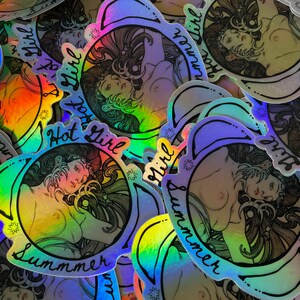 May include: Holographic stickers featuring a stylized illustration of a woman with long hair, a floral design, and the text "Hot Girl Summer." The stickers have a rainbow sheen and a black outline.
