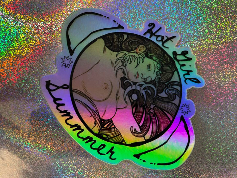 May include: Holographic sticker featuring a detailed illustration of a woman with long hair, with the words "Hot Girl Summer" in black script. The sticker has a rainbow gradient effect.