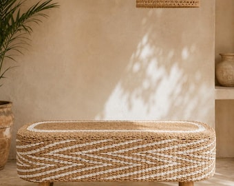Large bench made of woven plant fiber with teak legs