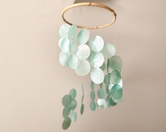 Light blue mother-of-pearl mobile wall decoration