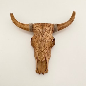 Small carved wooden buffalo head, wall decoration, ethnic decoration