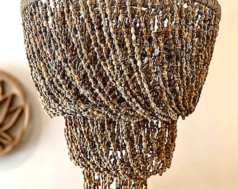 Boho chandelier made of brown seashells