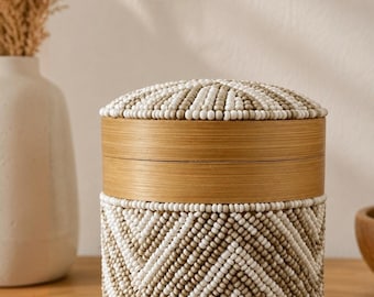 Decorative cylindrical box made of bamboo and white and beige beads