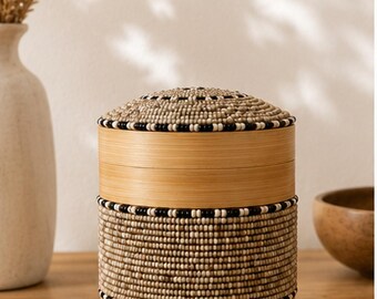 Decorative cylindrical box made of bamboo and beige and black beads