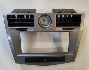 Dashboard trim with clock and air vents for Chrysler Sebring
