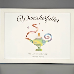 K&ouml;nnte beinhalten: Ein wei&szlig;er Rahmen mit wei&szlig;em Hintergrund und einer goldenen Wunschlampe aus Geld. Oben im Rahmen steht der Text "Wunscherschiller". Unten im Rahmen steht der Text "Alles Gute zum Geburtstag Sabine & Marcus".