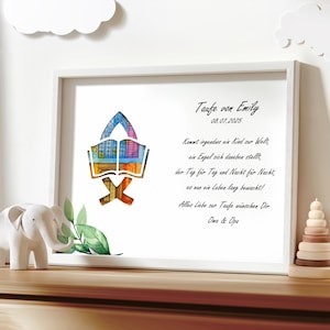 May include: A white framed print with a watercolor illustration of an open book with a dove above it. The print has the text "Taufe von Emily 08.07.2025" and a poem about a child's baptism.
